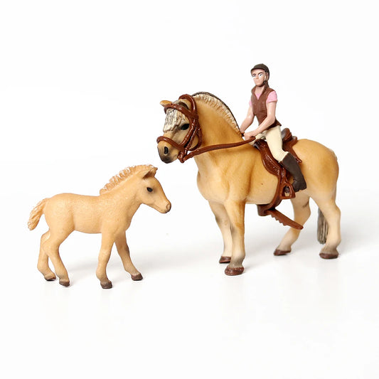 Fjord horse figurine with foal and rider figure