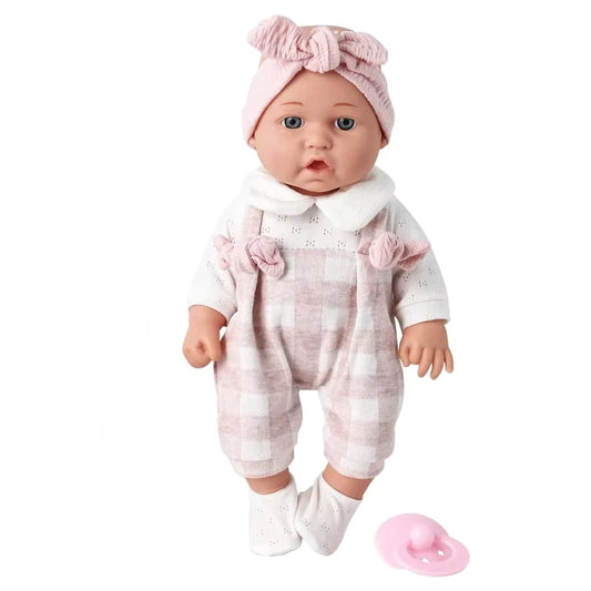 Close up of baby doll face with dummy