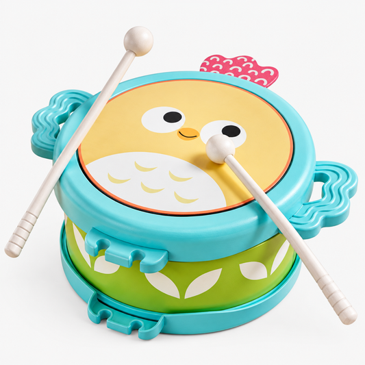 Wooden kids drum with owl animal print, angled view showing turquoise rim, green leaf-pattern base and side carry handles