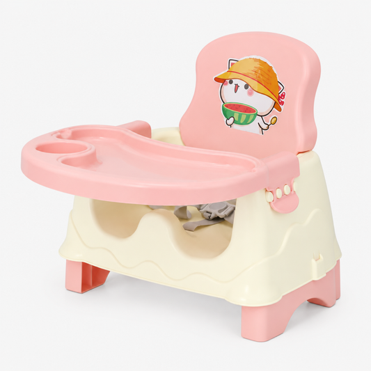 Pink baby booster dining chair with tray, side profile studio view