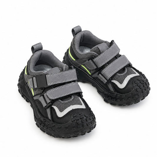 Kids chunky velcro trainers in grey, studio shot of the full shoe showing the chunky sole and hook-and-loop strap