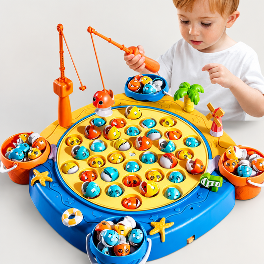 Toddler boy playing with the blue magnetic fishing game, using the magnetic rod to catch colourful fish pieces