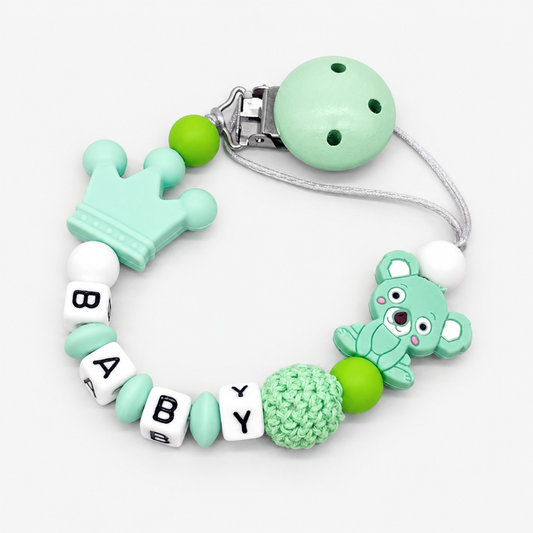 Personalised pacifier clip, mint green wood clip with koala and crown charm design
