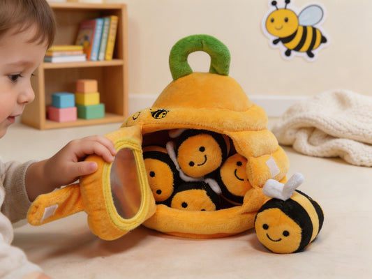 Child's hand reaching into the plush beehive to pull out a sensory bee