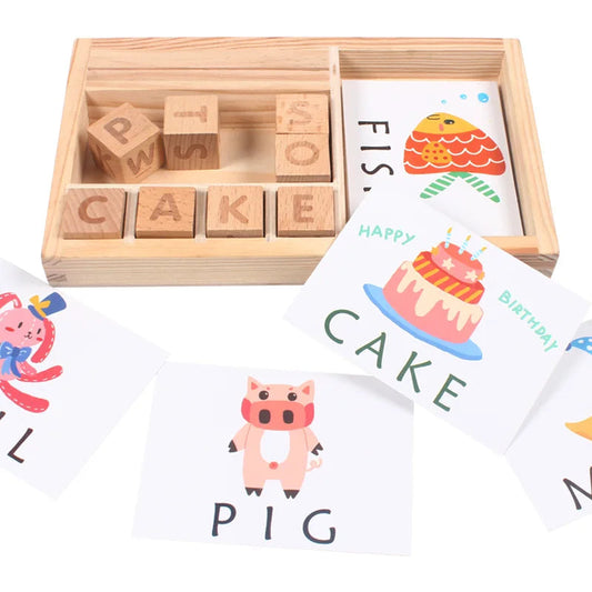 Wooden spelling tray with FISH and CAKE flashcards, PUFF spelled in letter blocks and a pig card alongside