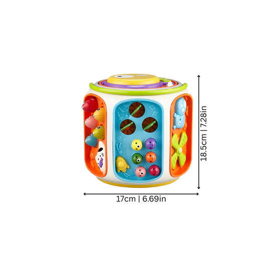 Toddler playing with the interactive musical activity cube