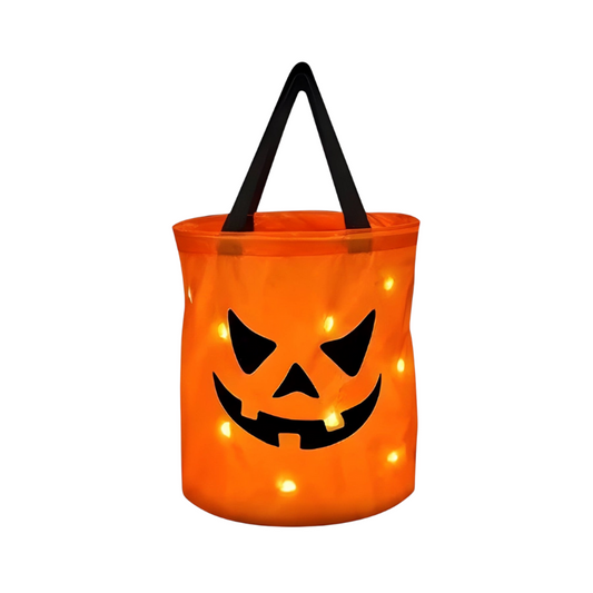 Halloween candy pumpkin bucket with LED lights, front view