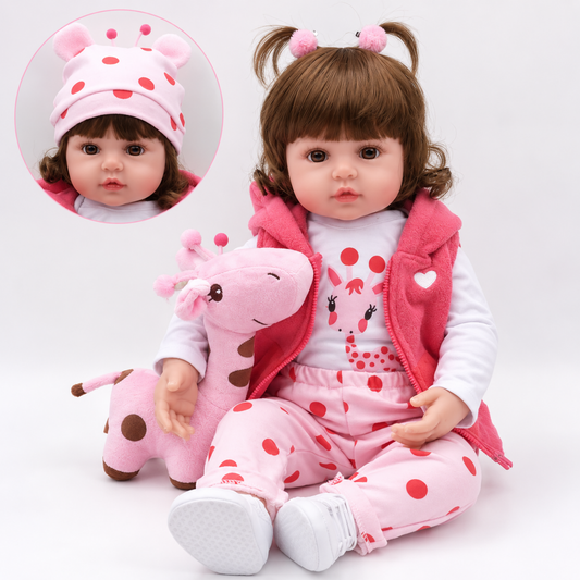 reborn toddler doll in pink giraffe outfit, full body front view