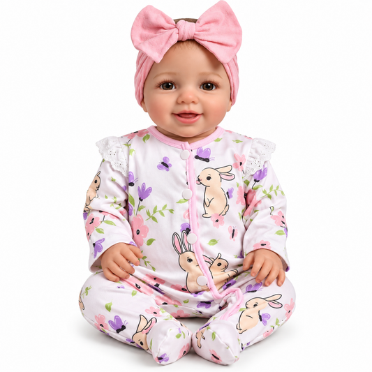 Reborn baby doll in bunny print outfit, front view