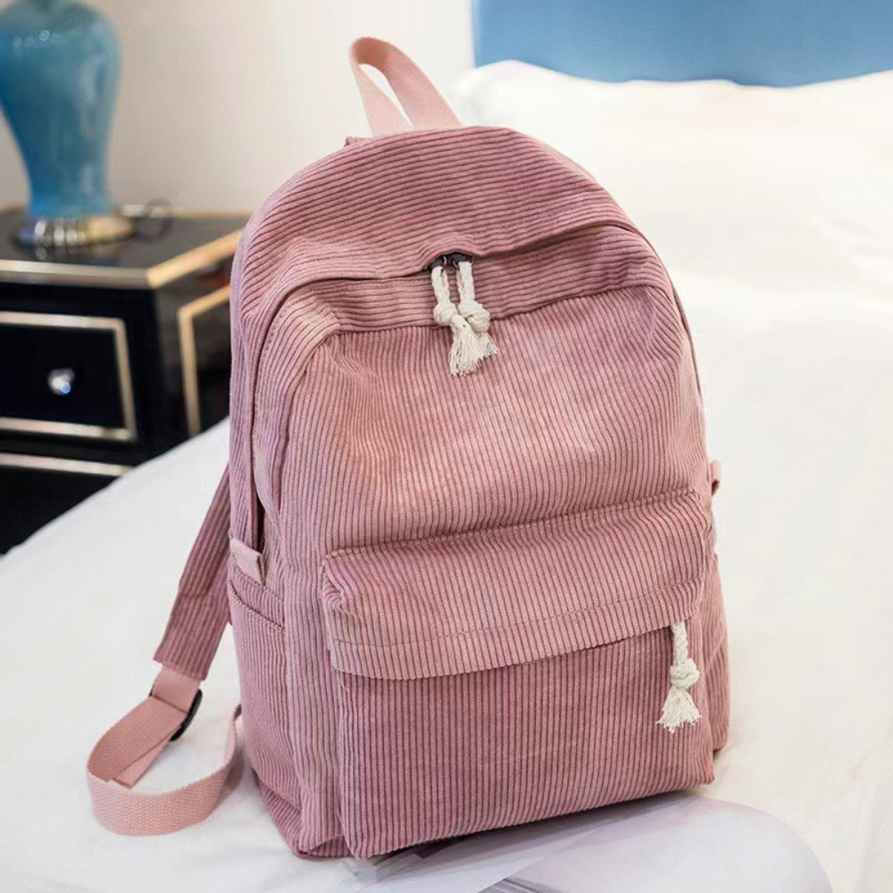 Pink corduroy backpack front view
