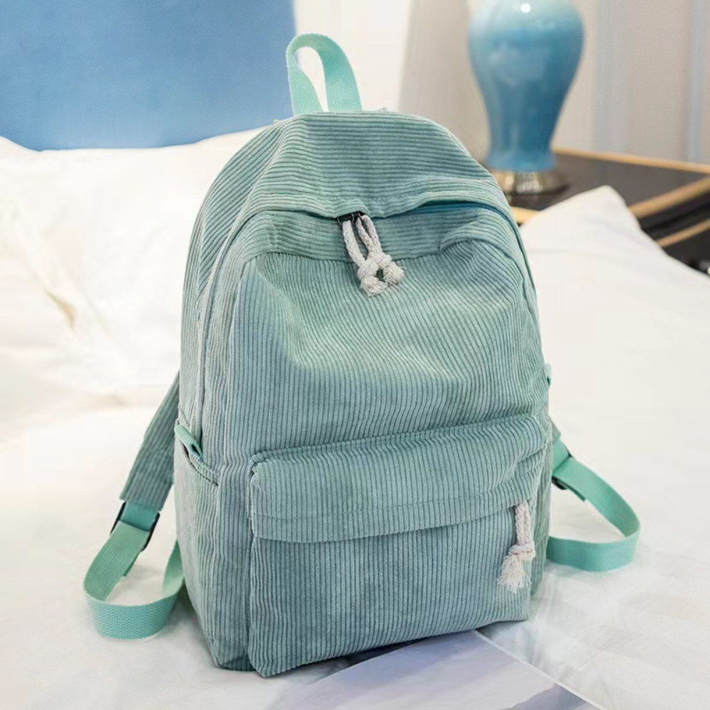 Green corduroy backpack front view