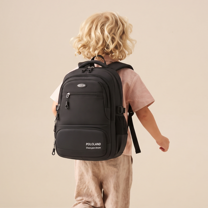 Black backpack worn on shoulders