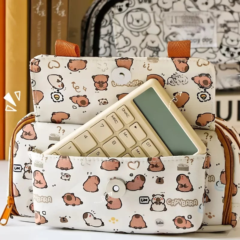 Capybara pencil case filled with pens