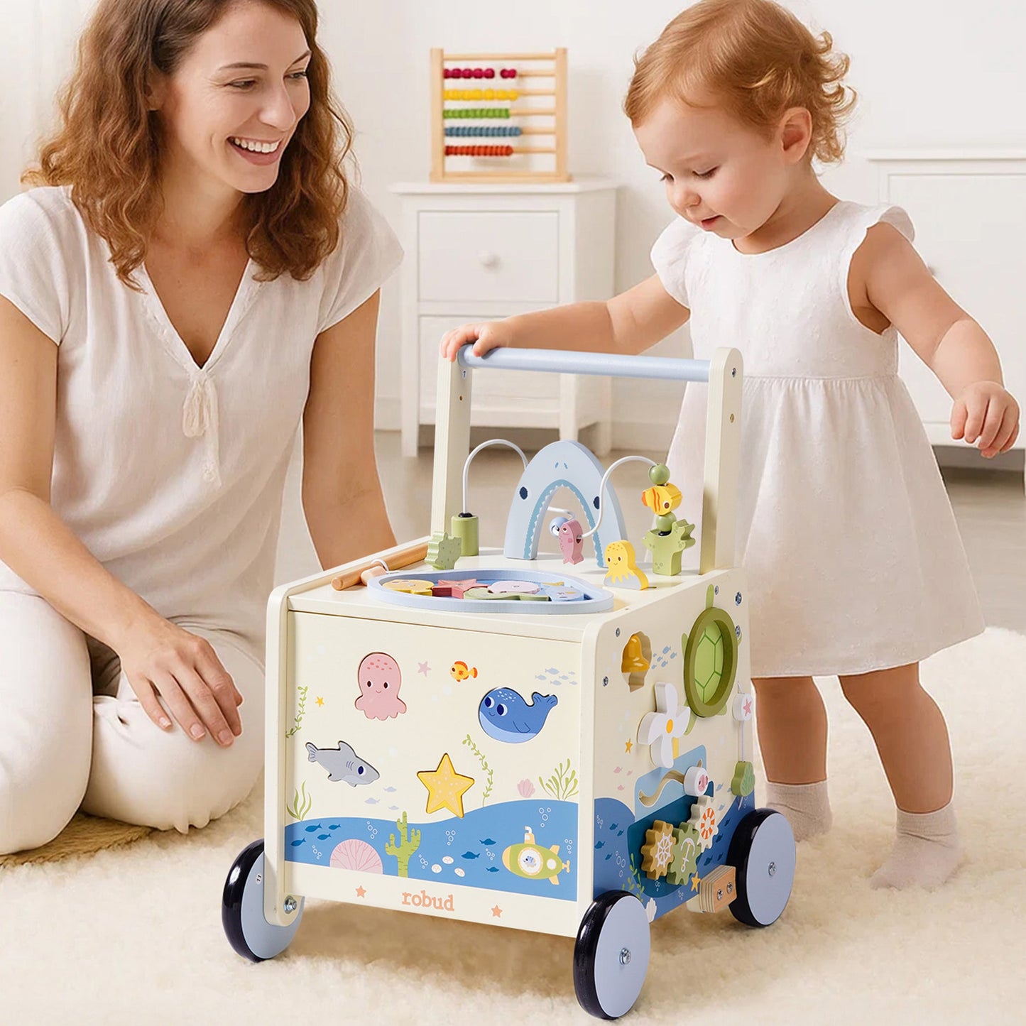 Baby walking with wooden push walker