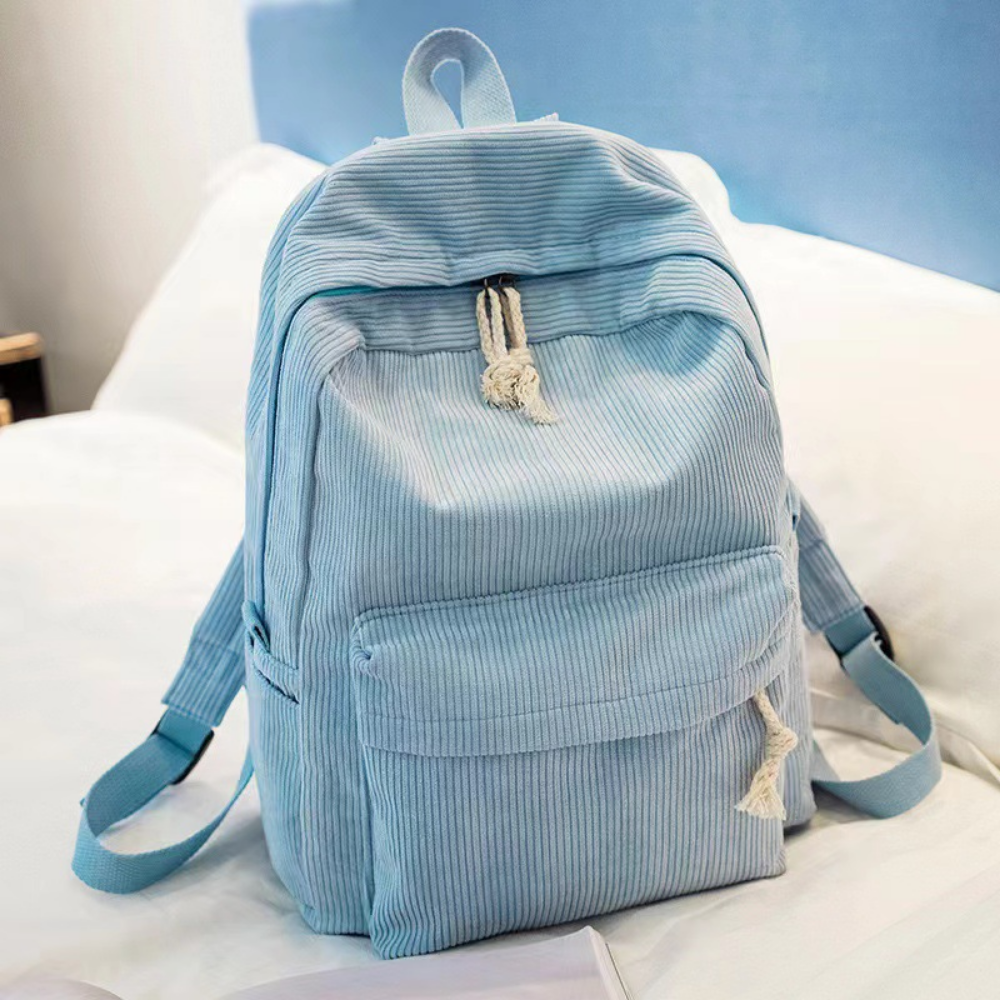 Blue corduroy backpack front view