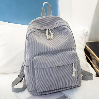 Grey corduroy backpack front view