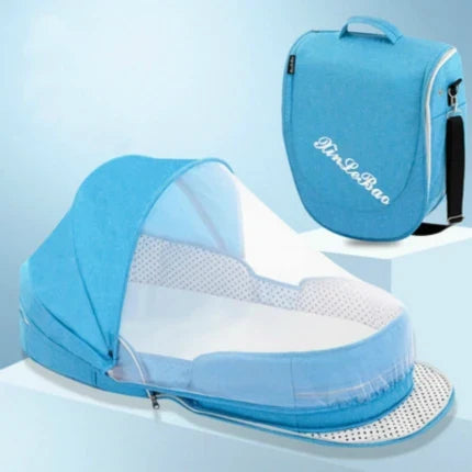 Blue baby travel bed with mosquito net