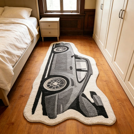 Grey car-shaped plush bedroom rug on floor