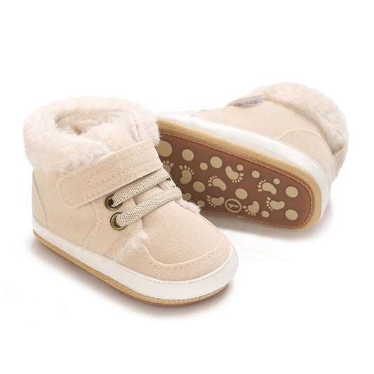 Apricot baby high-top sneakers showing footprint pattern sole