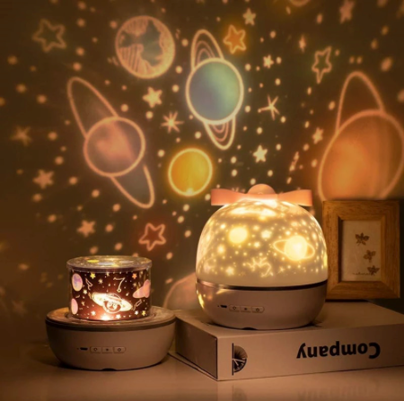 Star projector night light with 6 slide films for a kids room