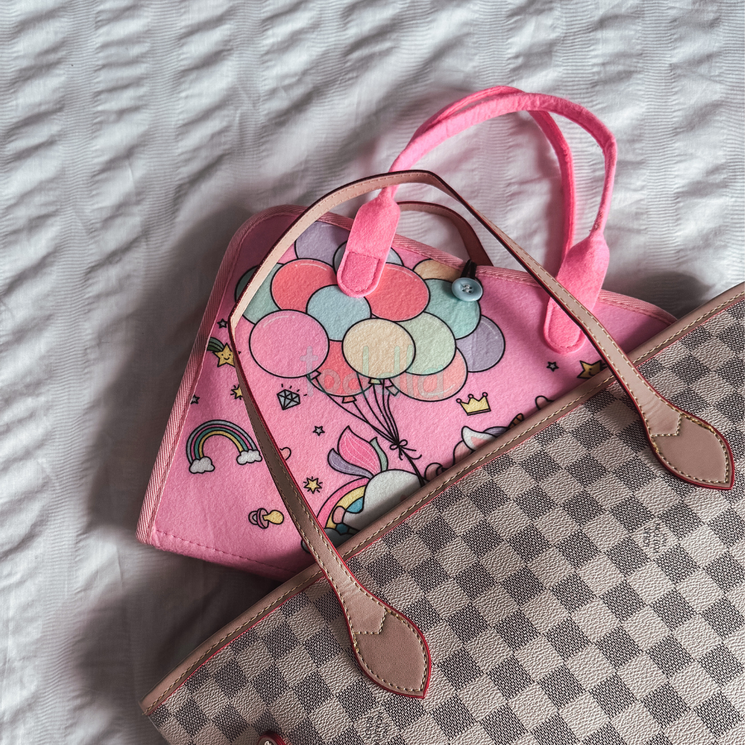 Montessori Busy Board fits in diaper bag
