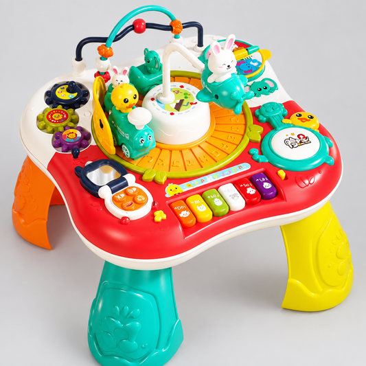 Red multifunctional activity table with electric train, front view
