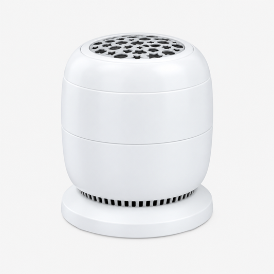 White dinosaur night light projector shown alone on a clean studio background, front three-quarter product view