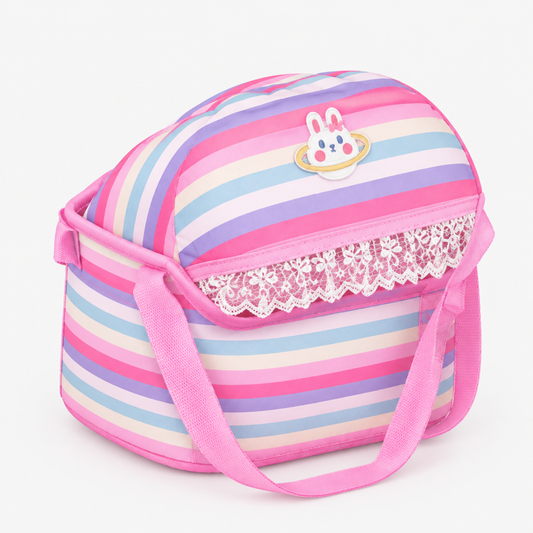Pink rainbow-striped doll carry basket closed, side angle view showing bunny charm and lace trim