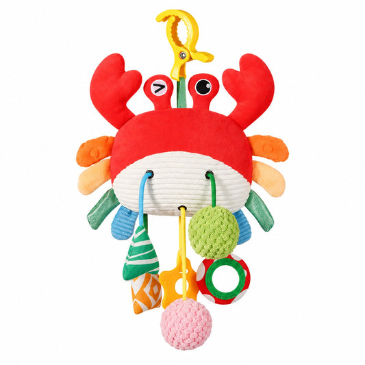 Hanging crib pull-string toy with plush red crab character, textured claws, and dangling crinkle rattle balls