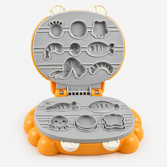 Close-up of the crab-shaped grill maker mold tool from the playdough craft kit