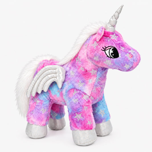 Pink magical unicorn plush toy with silver wings, silver horn and glittery star details, studio shot on white background