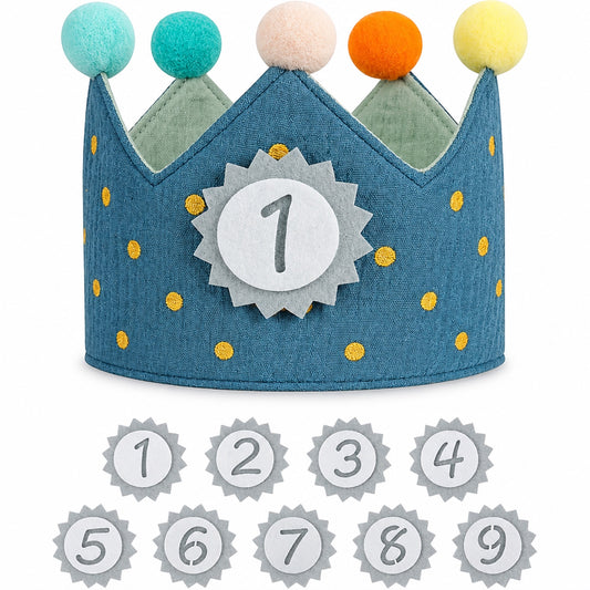 Blue muslin birthday crown with yellow polka dots, pastel pom-poms, number 1 badge and nine felt number patches 1-9