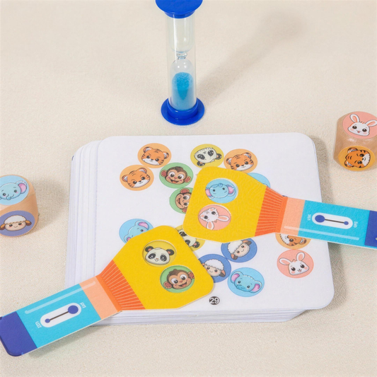 Reaction Contest game box with flashcards, dice, sand timer and flashlight paddles