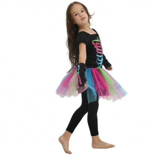 Girl wearing pink rainbow skeleton print tutu costume, side view