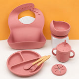 7-Piece Silicone Baby Feeding Set — Bib, Divided Plate, Suction Bowl, Sippy Cup & Wooden Utensils thumbnail 3