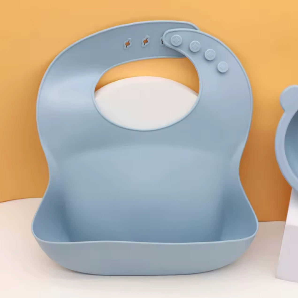 Silicone baby bib with food catcher pocket