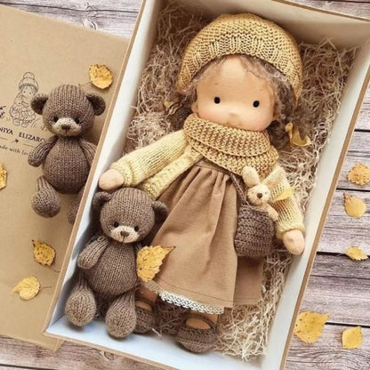 Handmade fabric doll in brown dress